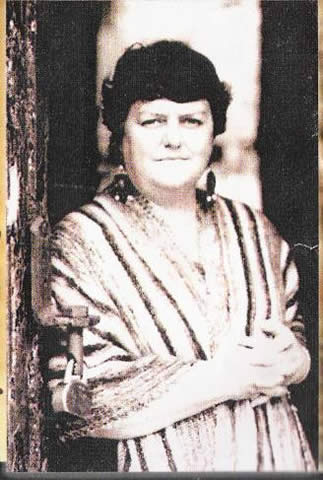 A woman wearing a shawl.