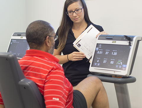 VSU student instructs a patient in the Center for Excercise Medicine & Rehabilitation.