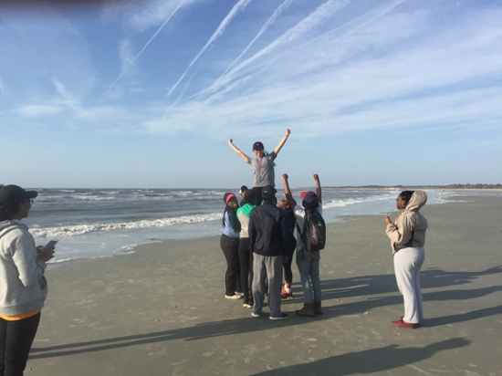 Students enjoying the beach