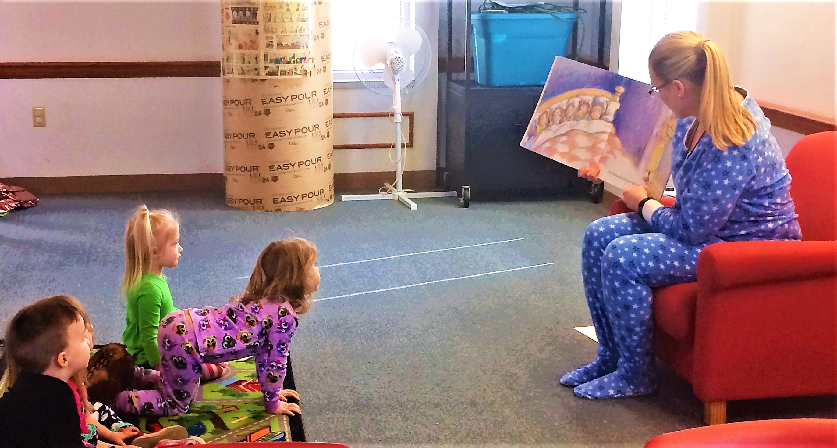 mirabello-reading-to-children-at-a-lucasville-library-toddler-time-pajama-party-2019.jpg
