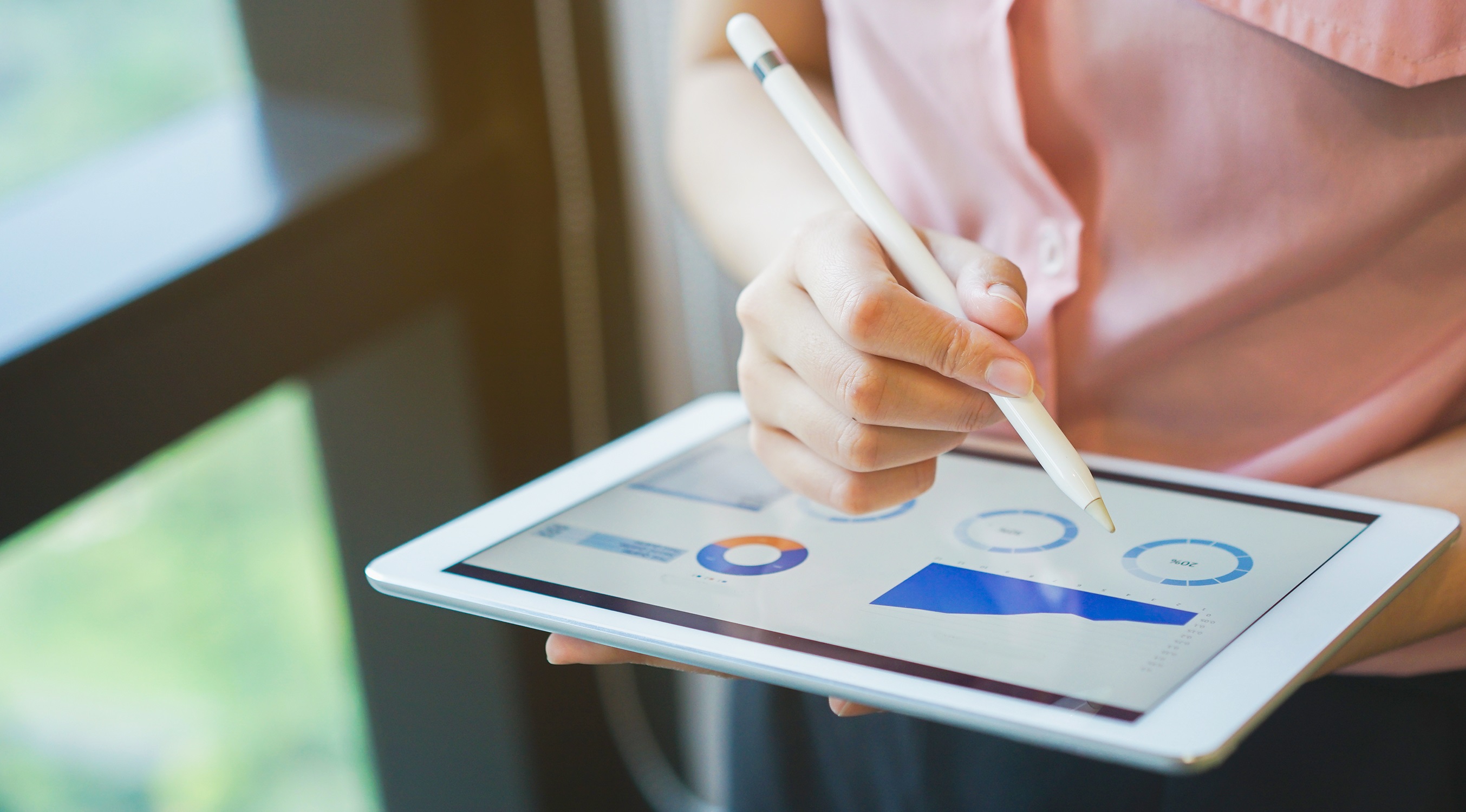 Image of student using stylus and tablet