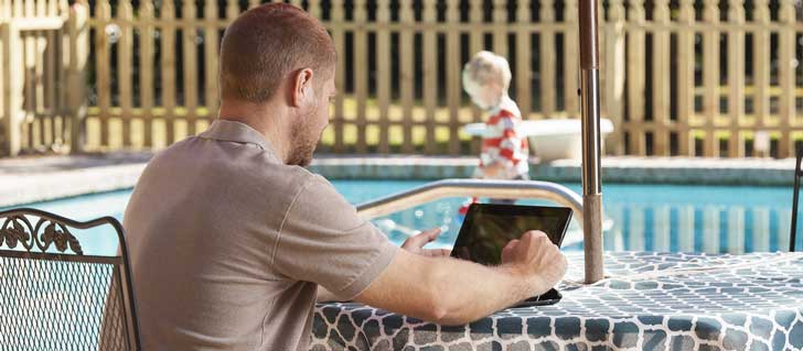 Online Student Studying by Pool