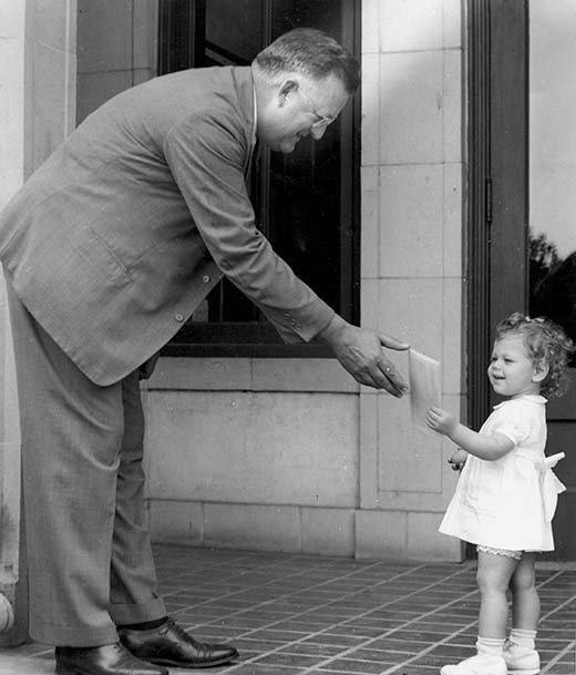 President Reade Greets a little girl