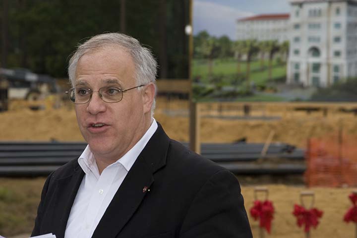 Patrick J. Schloss at a Ribbon Cutting