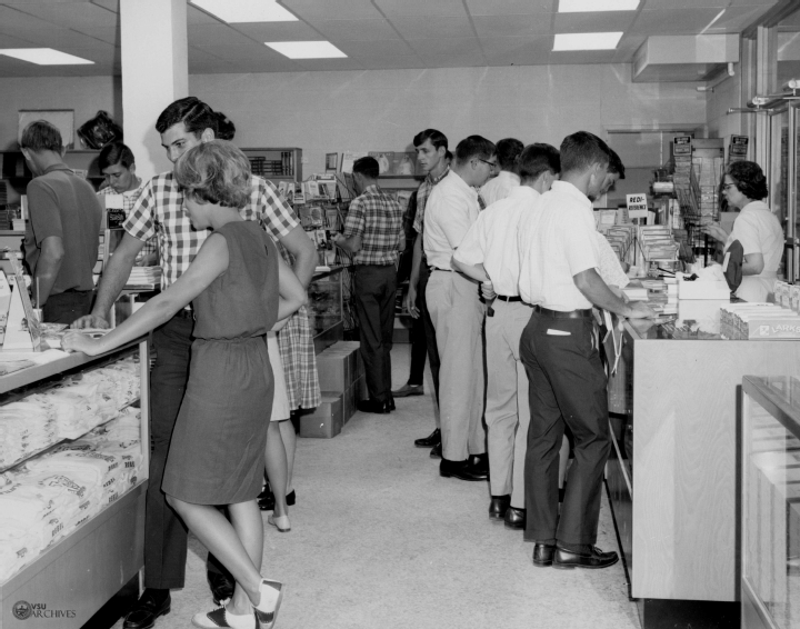 View of a busy bookstore with Male and Female students