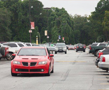 red car in parking lot