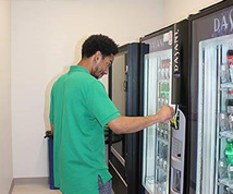 young man at a vending machine