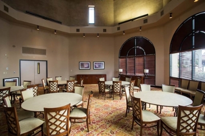 Executive Dining Room with 5 round tables with 6 chairs at each