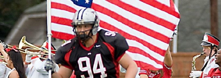 VSU Football Player Caries U.S. Flag 