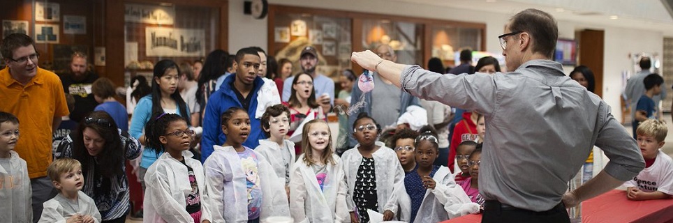 Younger students learn some cool chemistry during Science Saturday.