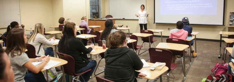 Psychology faculty member teaches class