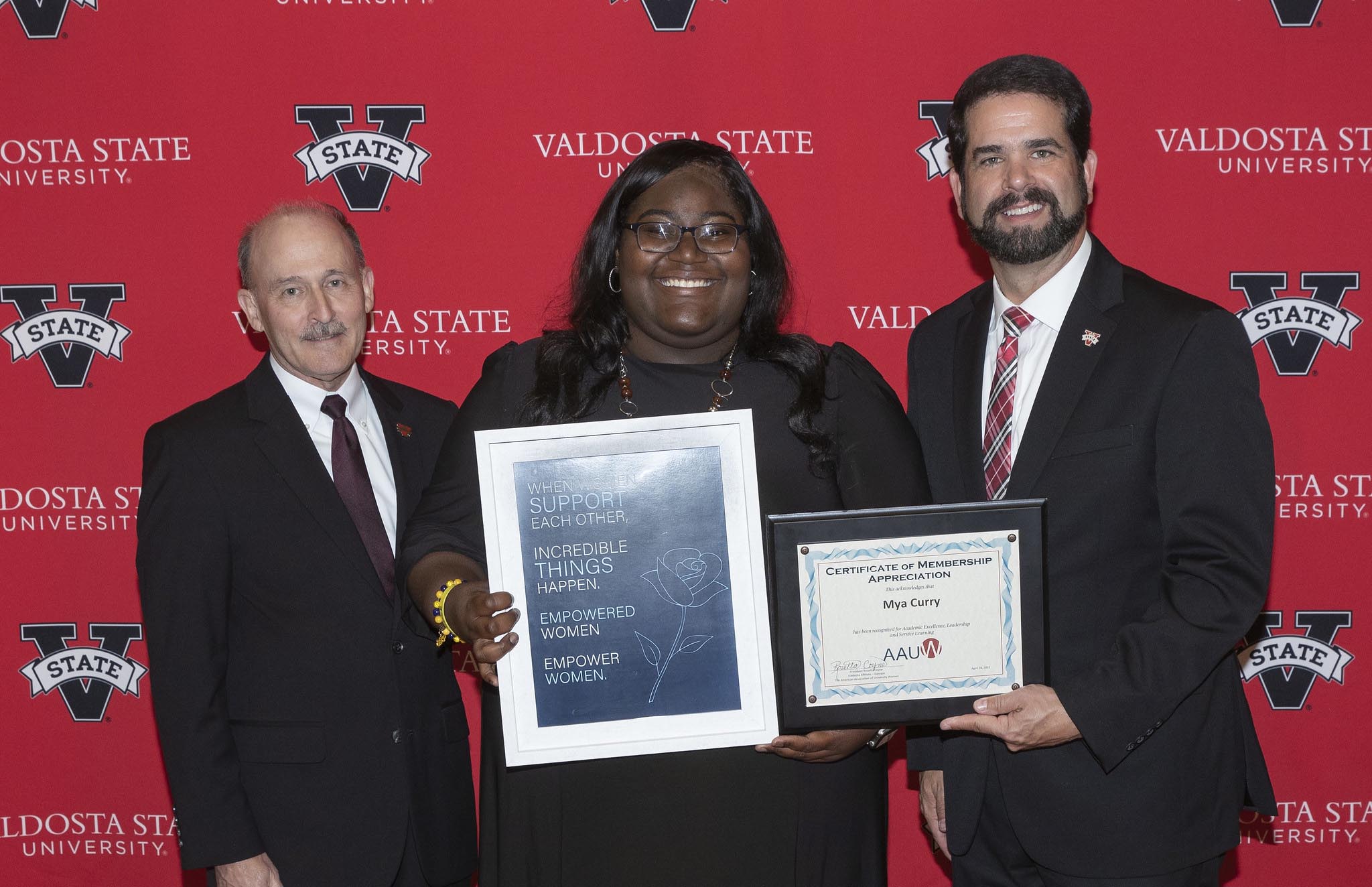 Mya Curry of Blackshear, Georgia, is the recipient of the 2022 American Association of University Women Award at Valdosta State University. She graduated summa cum laude with a Bachelor of Science in Middle Grades Education during VSU’s 223rd Commencement Ceremony on May 7. She is pictured with Dr. Robert Smith, provost and vice president for Academic Affairs, and Dr. Richard Carvajal, university president.
