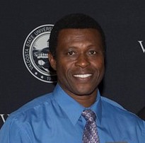 Dr. Eugene Asola