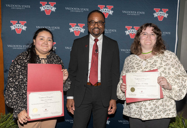 Dean Pierre-Richard Cornely with the CoSM Outstanding Student Finalists